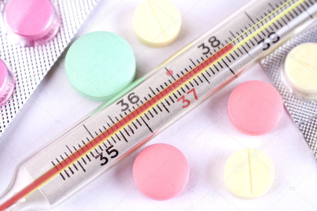 depositphotos 1436079 stock photo thermometer and pills